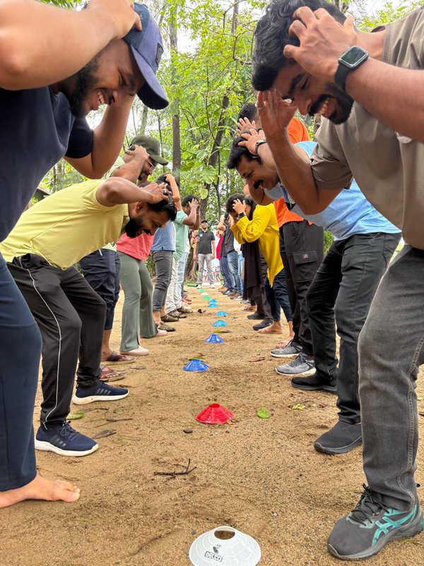 Participants lined up mid-challenge outdoors